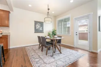 Great size dining room, could easily fit a variety of table sizes! Patio door leads to private enclosed patio area