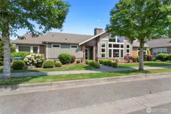 Front of clubhouse, short distance from subject home. Mailboxes accessed here.