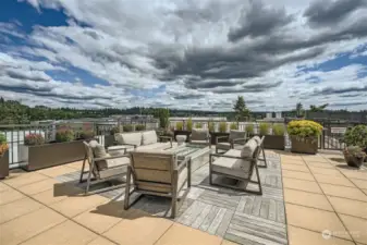 You will love the rooftop deck areas, with the open fireplace, BBQ area, tons of seating and beautiful plantings.