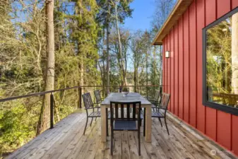 Railing made of stainless steel black cabling, keeping with the modern feel of the home. Facing east toward the backyard.