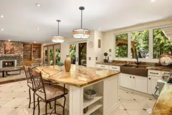 The kitchen flows right into the family room, which opens out onto a large outdoor deck. It's the perfect place for entertaining or relaxing on a beautiful day.