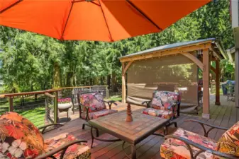 You will love the beauty of this custom IPE (Brazilian Ironwood) deck. It is constructed with high-quality materials and expert craftsmanship. Brazilian ironwood is not only one of the most beautiful, but also one of the strongest hardwoods in the world. It is resistant to rot, insects and decay, and it is incredibly durable and long-lasting. It's a great addition to your home, and it is sure to be enjoyed for many years to come.