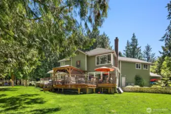Imagine this to be a perfect place to enjoy the warm summer days and sunsets on a beautiful deck. The landscaping here is stunning. You could grill something, listen to some music, and spend hours talking and laughing.