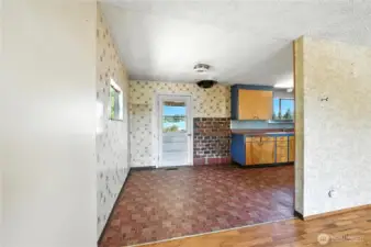Dining area with back door to deck