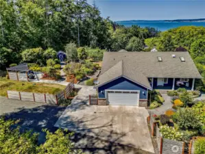 Home is sited on 2 lots, basically a little island of its own, if you purchase the additional lot.