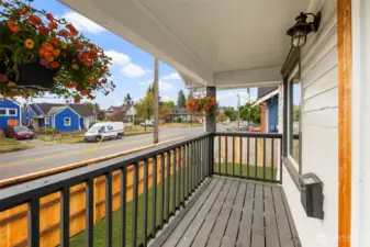 Refinished Front Porch Deck. Grass is virtually edited