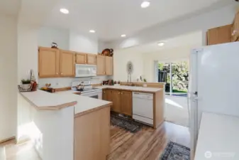 Bar seating on both sides of the kitchen, perfect for entertaining!