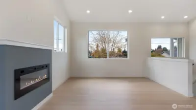 Great room with vaulted ceiling, easy care LVP flooring & lots of light.