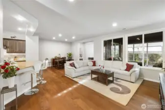 Come on in - the environment is WONDERFUL! Check out the open space with adjacent biophilic style living that brings the outdoors in - this is a perfect Trilogy of Tehaleh style of living.