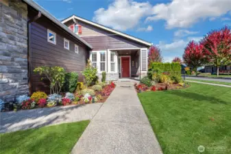 Welcome home! This lovely walkway is lit up at night and rain or shine, this is an absolute jewel of the neighborhood!