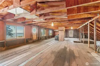 The views from the attic are the best - this space is awaiting your imagination - or if you tear down the home, you can really maximize the view from a second story with a completely new design and build.