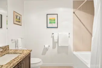 Sparkling clean full bath with durable tile flooring.