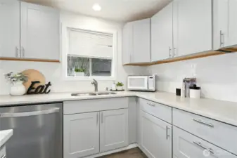 Garden window and subway tile.