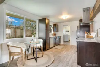 Intimate sitting nook in the kitchen. A nice place to get off your feet while keeping an eye on whatever is happening in the backyard.