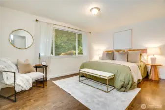 This is the primary bedroom on the main floor. Located in the northeast corner of the home.