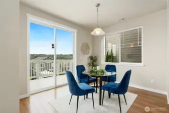 Eating area just off kitchen with stunning valley views.