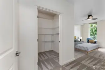 Large walk in closet off one of the bedroom suites. This condo is Virtual Staged.