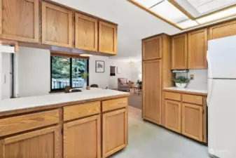 Kitchen area connects to an informal eating area and bonus room.