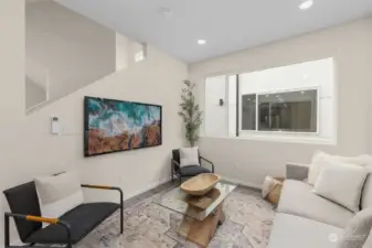 With a sleek staircase leading up, high ceilings, and modern finishes, this is where contemporary design meets everyday comfort. Time to make yourself at home!
