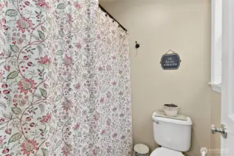 Full bathroom in upstairs hallway.