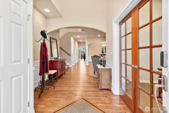 Beautiful entry with refinished hardwood floors.