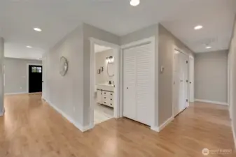 This intersecting hallway design makes the second bathroom and linen closet easily accessible from all areas.