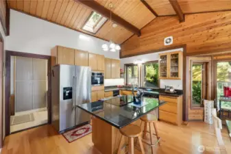 Kitchen with granite countertops and large island