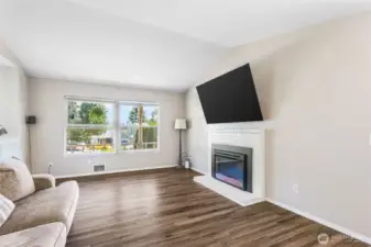 Formal Sitting room with new electric fire place insert.