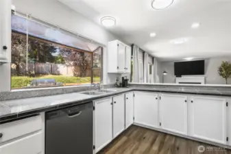 Large window behind the sink giving you a perfect view of the backyard.