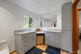 The main floor offers a large bathroom with plenty of light and floor space.