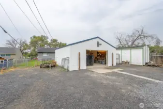 Storage shed and 24x24 shop. Room for boat and RV