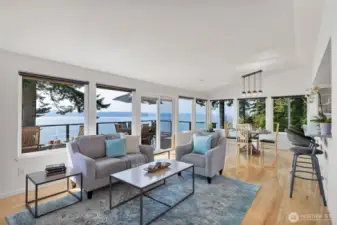 Wall to wall windows capturing gorgeous views of the Hood Canal and Olympics!
