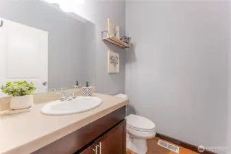 Main floor powder room next to the flex space