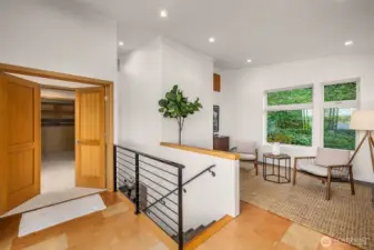Upper level flex space features cork flooring, sliders out to the deck and french doors.