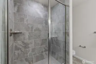 Primary bedroom with ensuite bathroom