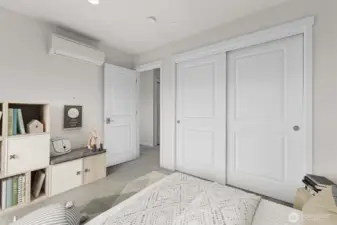 Another bedroom on the upper third level (virtually staged)