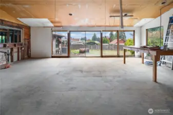 Huge light filled family room and dining room overlooking the patio and backyard.