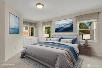 Virtually staged primary bedroom has lots of natural light coming in from the 3 windows.