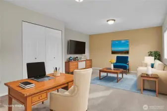 .....set up the same room as a home office with an area for gaming, movie watching, kids play area. With this much space, there are endless possibilities! (virtually staged).