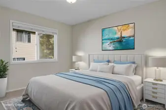 Virtually staged guest bedroom on the upper floor.