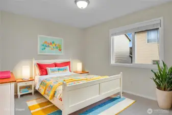 Virtually staged kids room on the upper level.