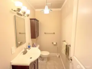 Handy half bath located off hallway closest to great room.
