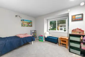 The third bedroom on the upper level