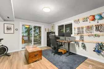 Step through the family room slider onto a generous two-tiered deck and side yard, perfect for entertaining and enjoying indoor-outdoor living.