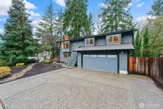 Surrounded by mature trees, this home offers a large driveway, a two-car garage with an EV charging wall outlet, and a fully fenced backyard. Enjoy the opportunity to live in one of Woodinville’s most desirable neighborhoods, just a short walk to downtown Woodinville.