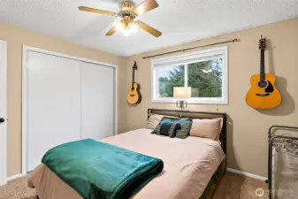 Primary bedroom with 1/2 bath