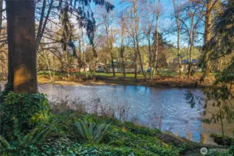 Concrete steps down to the river on right hand side of this photo.