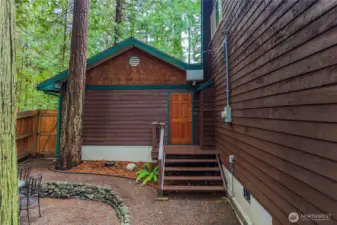 Door off garage to backyard.
