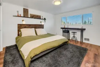 Spacious bedroom located at the back of the unit for quiet nights. Ample space for a desk, dresser, and king-size bed.