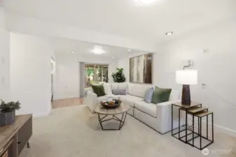 The open layout continues with comfortable living areas.